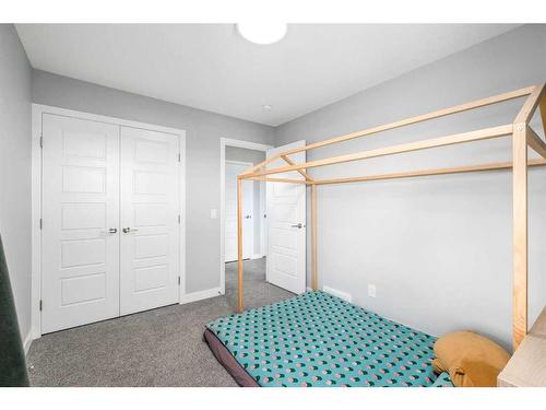 133 Magnolia Terrace Se, Calgary, AB - Indoor Photo Showing Bedroom