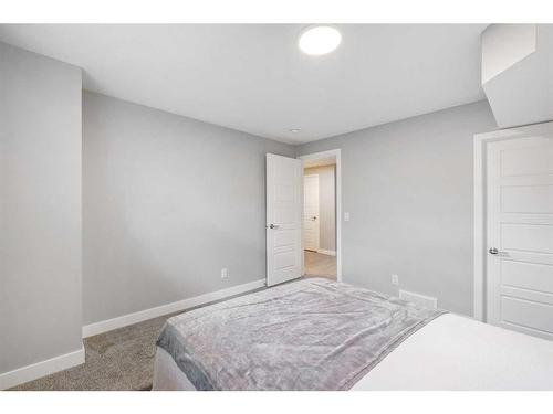 133 Magnolia Terrace Se, Calgary, AB - Indoor Photo Showing Bedroom
