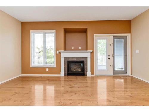 20 Shaw Close, Red Deer, AB - Indoor Photo Showing Living Room With Fireplace
