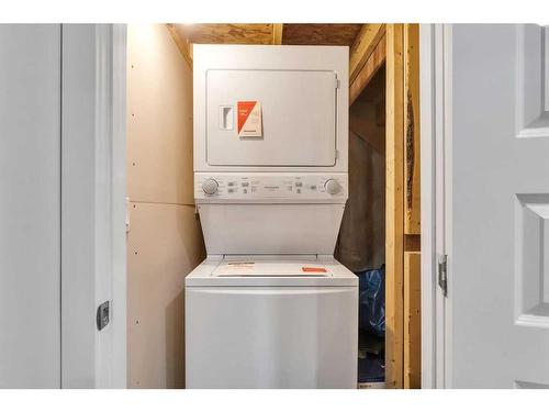 26 Evanston Hill Nw, Calgary, AB - Indoor Photo Showing Laundry Room