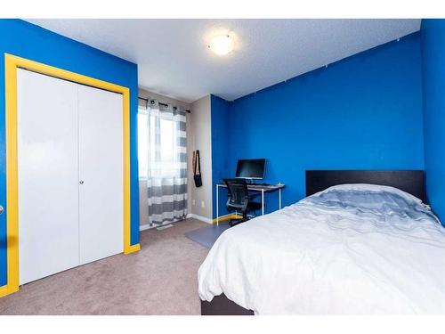 1839 New Brighton Drive Se, Calgary, AB - Indoor Photo Showing Bedroom