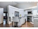 226 Sienna Park Gardens Sw, Calgary, AB  - Indoor Photo Showing Kitchen With Stainless Steel Kitchen With Upgraded Kitchen 