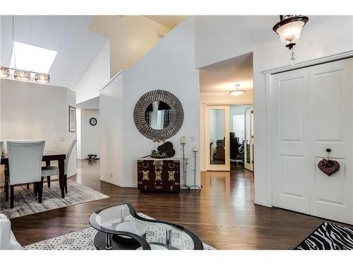 226 Sienna Park Gardens Sw, Calgary, AB - Indoor Photo Showing Living Room