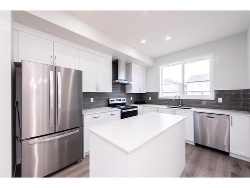 25 Corner Glen Row Ne, Calgary, AB - Indoor Photo Showing Kitchen With Stainless Steel Kitchen With Upgraded Kitchen