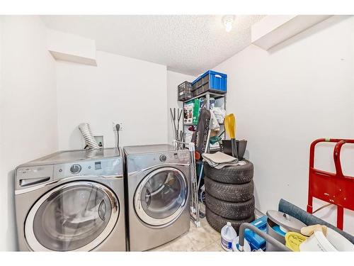 2207-2600 66 Street Ne, Calgary, AB - Indoor Photo Showing Laundry Room
