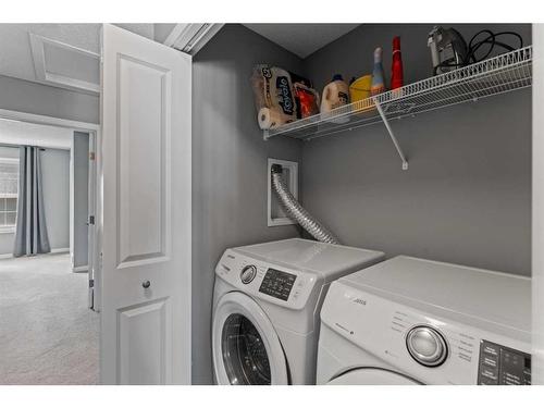 167 Nolancrest Common Nw, Calgary, AB - Indoor Photo Showing Laundry Room