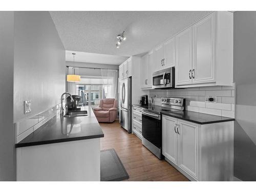 167 Nolancrest Common Nw, Calgary, AB - Indoor Photo Showing Kitchen With Double Sink