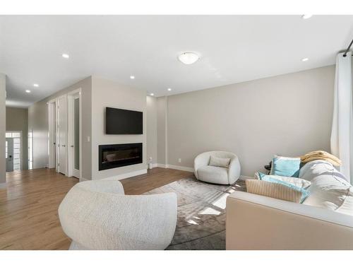 330 Yorkville Road Sw, Calgary, AB - Indoor Photo Showing Living Room With Fireplace