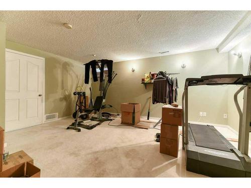 193 Prestwick Acres Se, Calgary, AB - Indoor Photo Showing Gym Room