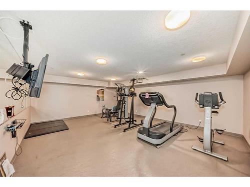 117-500 Rocky Vista Gardens Nw, Calgary, AB - Indoor Photo Showing Gym Room