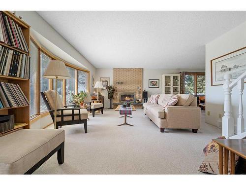 359 Silver Valley Boulevard Nw, Calgary, AB - Indoor Photo Showing Other Room With Fireplace