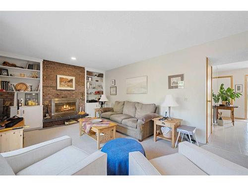 359 Silver Valley Boulevard Nw, Calgary, AB - Indoor Photo Showing Living Room With Fireplace