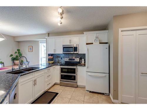5 Citadel Meadow Gardens Nw, Calgary, AB - Indoor Photo Showing Kitchen With Double Sink