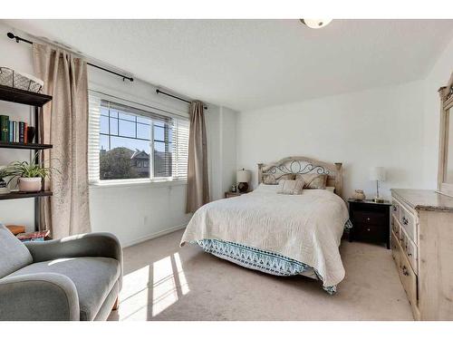 121 Crystal Shores Grove, Okotoks, AB - Indoor Photo Showing Bedroom