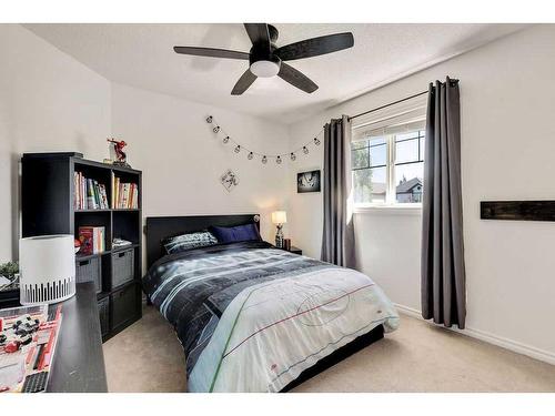 121 Crystal Shores Grove, Okotoks, AB - Indoor Photo Showing Bedroom