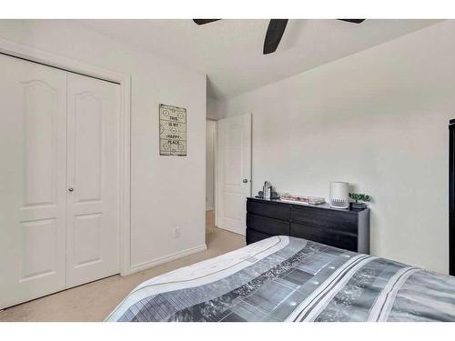 121 Crystal Shores Grove, Okotoks, AB - Indoor Photo Showing Bedroom