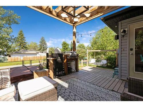 121 Crystal Shores Grove, Okotoks, AB - Outdoor With Deck Patio Veranda With Exterior