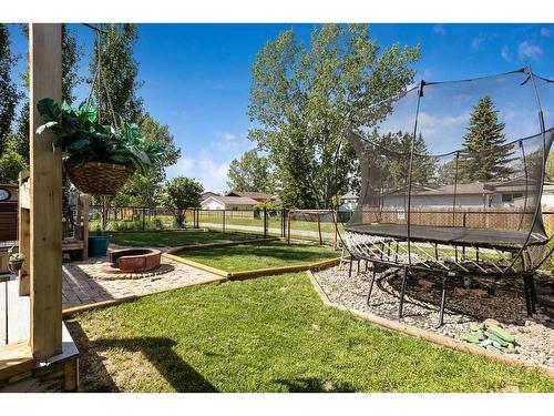 121 Crystal Shores Grove, Okotoks, AB - Outdoor With Deck Patio Veranda