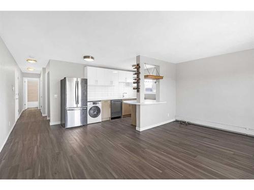 401-1817 16 Street Sw, Calgary, AB - Indoor Photo Showing Laundry Room