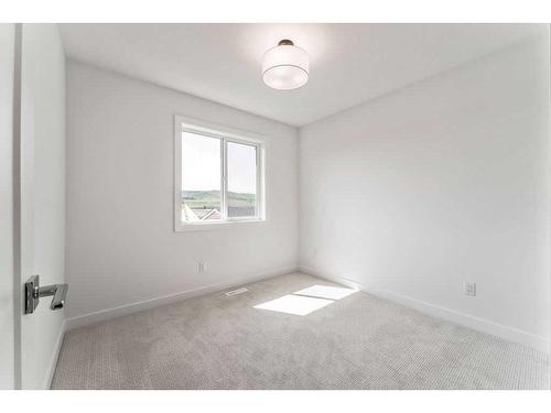 225 Creekside Drive Sw, Calgary, AB - Indoor Photo Showing Other Room