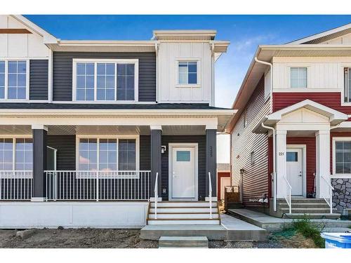 225 Creekside Drive Sw, Calgary, AB - Outdoor With Facade
