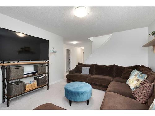 305 Carringvue Manor Nw, Calgary, AB - Indoor Photo Showing Living Room