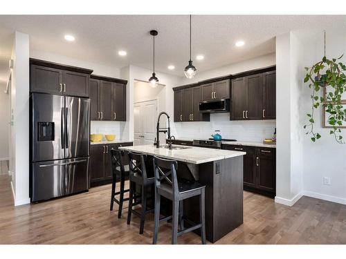 305 Carringvue Manor Nw, Calgary, AB - Indoor Photo Showing Kitchen With Stainless Steel Kitchen With Upgraded Kitchen