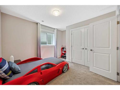 13 Cranbrook Close Se, Calgary, AB - Indoor Photo Showing Bedroom