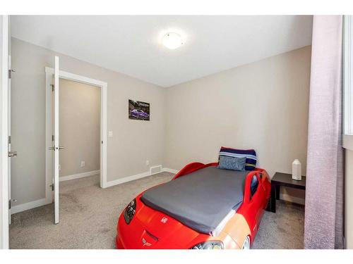 13 Cranbrook Close Se, Calgary, AB - Indoor Photo Showing Bedroom