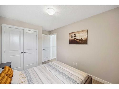 13 Cranbrook Close Se, Calgary, AB - Indoor Photo Showing Bedroom