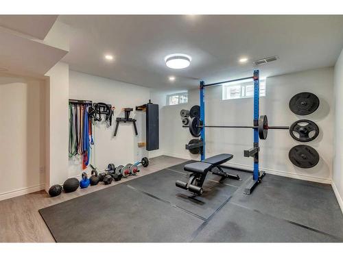 8244 7 Street Sw, Calgary, AB - Indoor Photo Showing Gym Room