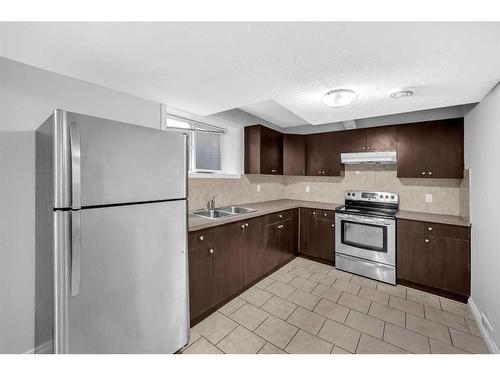 422 Taralake Way Ne, Calgary, AB - Indoor Photo Showing Kitchen With Double Sink