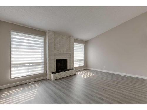 1419 31 Street Sw, Calgary, AB - Indoor Photo Showing Living Room With Fireplace