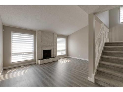 1419 31 Street Sw, Calgary, AB - Indoor Photo Showing Living Room With Fireplace