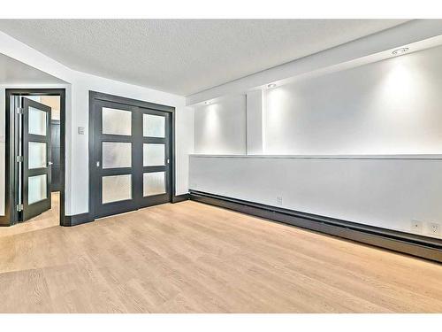 103-1815 16 Street Sw, Calgary, AB - Indoor Photo Showing Other Room