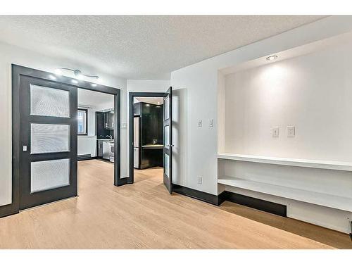 103-1815 16 Street Sw, Calgary, AB - Indoor Photo Showing Other Room