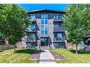 103-1815 16 Street Sw, Calgary, AB  - Outdoor 