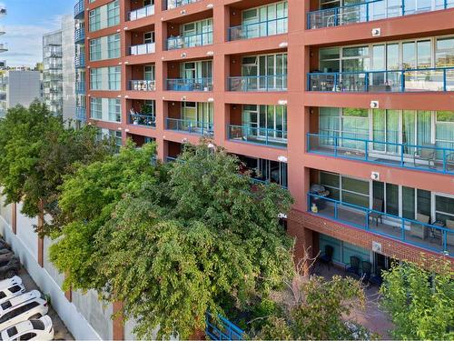 310-205 Riverfront Avenue Sw, Calgary, AB - Outdoor With Balcony With Facade