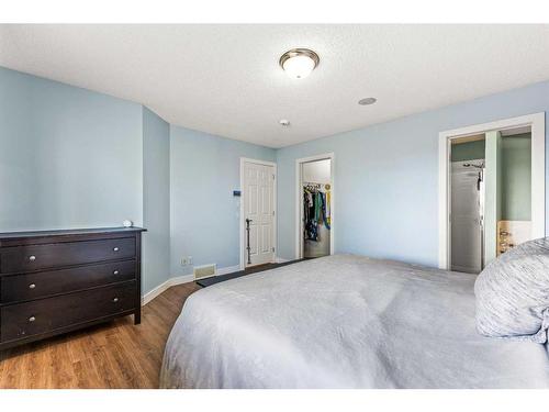 75 Brightondale Crescent Se, Calgary, AB - Indoor Photo Showing Bedroom