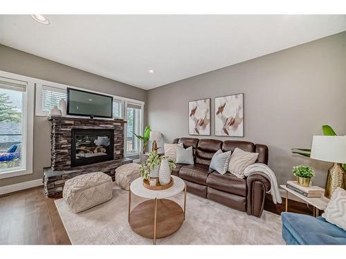 1412 26A Street Sw, Calgary, AB - Indoor Photo Showing Living Room With Fireplace
