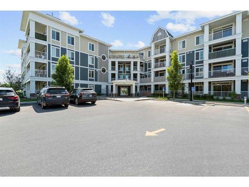 316-110 Auburn Meadows View Se, Calgary, AB - Outdoor With Balcony With Facade