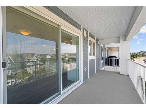 316-110 Auburn Meadows View Se, Calgary, AB - Outdoor With Balcony With Exterior