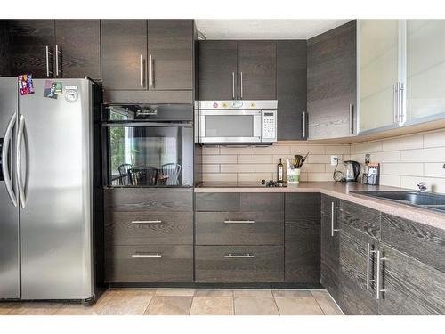 15 Templemont Drive Ne, Calgary, AB - Indoor Photo Showing Kitchen