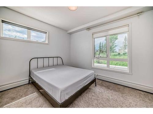 2104-175 Silverado Boulevard Sw, Calgary, AB - Indoor Photo Showing Bedroom