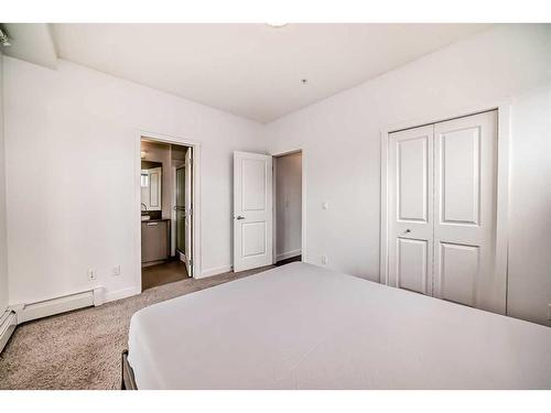 2104-175 Silverado Boulevard Sw, Calgary, AB - Indoor Photo Showing Bedroom