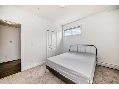 2104-175 Silverado Boulevard Sw, Calgary, AB - Indoor Photo Showing Bedroom