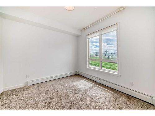 2104-175 Silverado Boulevard Sw, Calgary, AB - Indoor Photo Showing Other Room