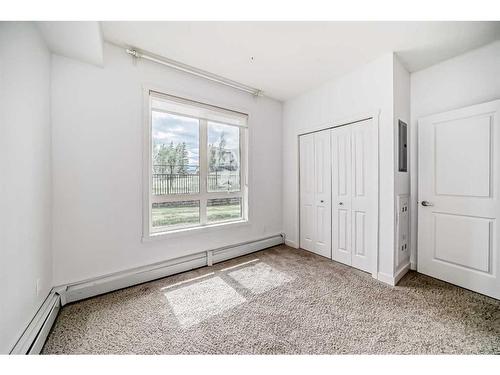 2104-175 Silverado Boulevard Sw, Calgary, AB - Indoor Photo Showing Other Room