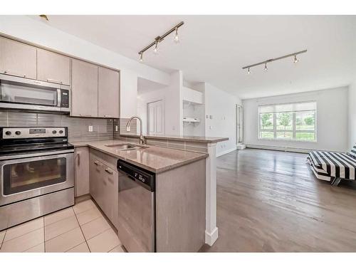 2104-175 Silverado Boulevard Sw, Calgary, AB - Indoor Photo Showing Kitchen With Stainless Steel Kitchen