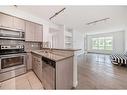 2104-175 Silverado Boulevard Sw, Calgary, AB  - Indoor Photo Showing Kitchen With Stainless Steel Kitchen 